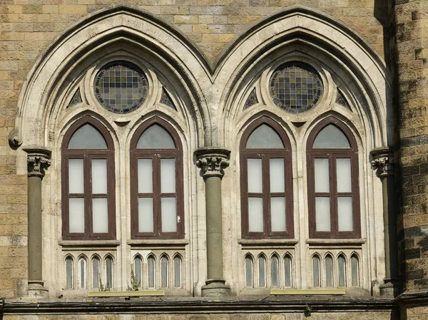 Architecture: Close up of Lancent Arched Windows with Glass Pane