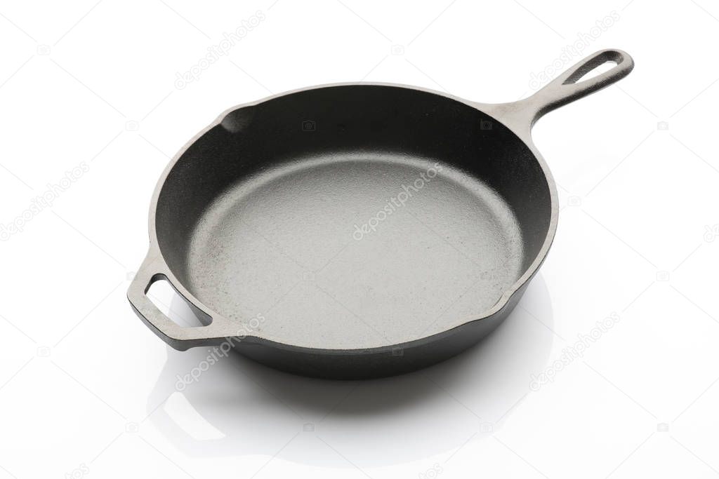 Top View of Seasoned Cast Iron Skillet on White Background