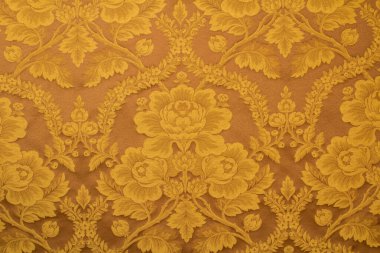 Güzel, parlak bir kumaş üzerinde sarı buketler