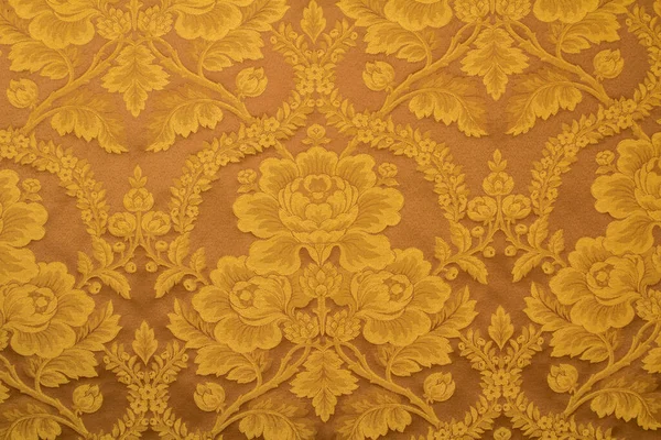 Güzel, parlak bir kumaş üzerinde sarı buketler