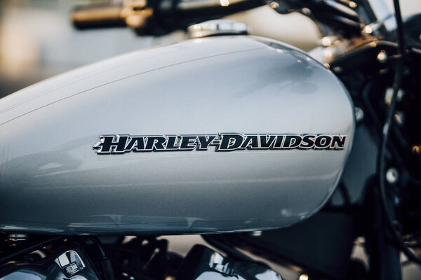 Ho Chi Minh city, Vietnam - March 25 2020: New Harley-Davidson Break Out 114 2020 is parked outdoor in Ho Chi Minh city. Powerful classic bike with black leather, grey and chrome details, Milwaukee-Eight large V2 engine. Landmark 81 and Bitexco tower