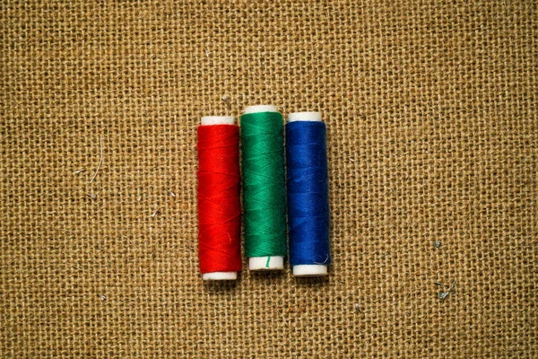 Conceito Costura Fios Bordado São Vermelho Verde Azul Ciano Magenta — Fotografia de Stock