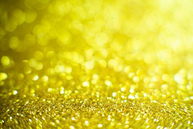 Parlak ve ışıl ışıl bir arka plan. Altın ve elmas tozu bokeh - parıltı dokusundan gelen bulanık ışık. Mavi renkli lüks tasarım arka planı. Altın renkli ışıltılı arka plan Bokeh altın ışıklarıyla.