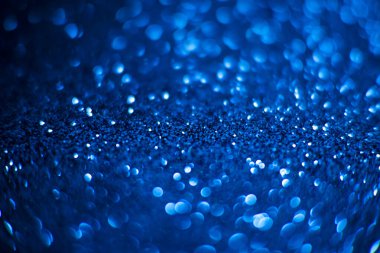 Soyut mavi ışıltı arka plan, parlak parıltı, soyut parıltı - mavi parıltı altın Noel ışıkları ve parlak arka plan