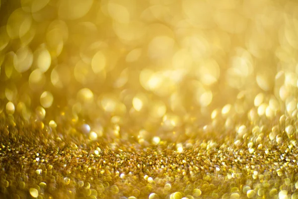 Parlak ve ışıl ışıl bir arka plan. Altın ve elmas tozu bokeh - parıltı dokusundan gelen bulanık ışık. Mavi renkli lüks tasarım arka planı. Altın renkli ışıltılı arka plan Bokeh altın ışıklarıyla.