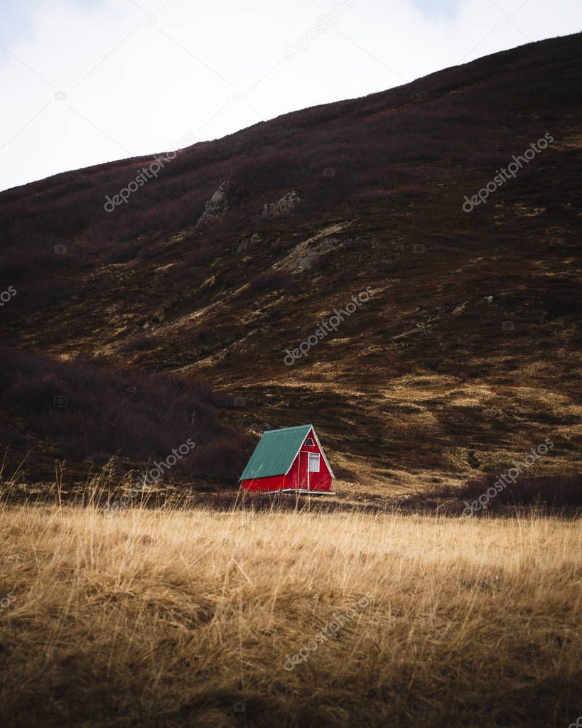 Red cabin in Icelandic wilderness