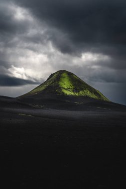 Single black stone mountain on the Laugavegur trek in Iceland
