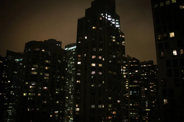 stock image Windows illuminated in apartments and skyscrapers in Chicago at night