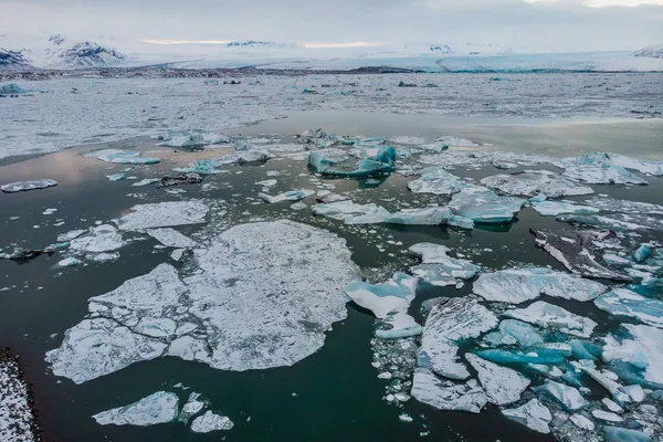 Aerial view of icebergs floating on Jokulsarlon lagoon Iceland — 스톡 사진