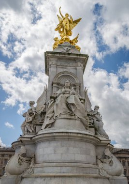Queen Victorial Memorial statue in front of Buckhingham Palace in London United Kingdom UK. clipart