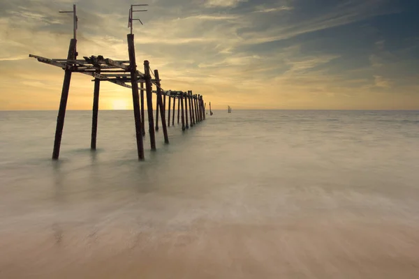 Peaceful and clear water among the sunrise scene