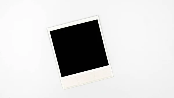 Retro empty photo frame. White plastic border isolated on white. Template photography, polaroid. — Stock Photo, Image