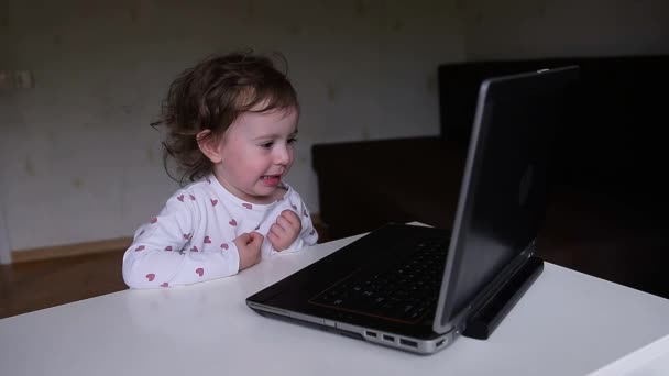 Charming Little Girl Sits Laptop Watches Learns Distance Participates Early — Αρχείο Βίντεο