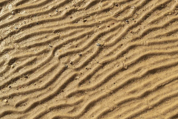 추상적 형태로 모래를 적시는 — 스톡 사진