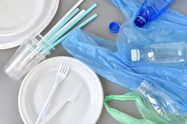 Plastic products, plates, fork and knife, produce bags, straws, cups, bottles