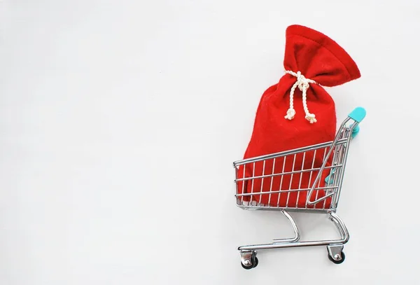 Christmas Shopping Sale Concept Red Santa Claus Sack Shopping Cart — 스톡 사진