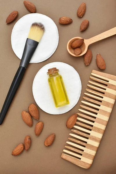 Organic cosmetic almond oil for natural skin and hair care, brown bottle mock up.