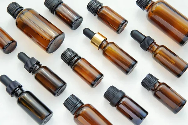 Patroon Gemaakt Van Verschillende Bruine Cosmetische Essentiële Olie Flessen Aromatherapie — Stockfoto