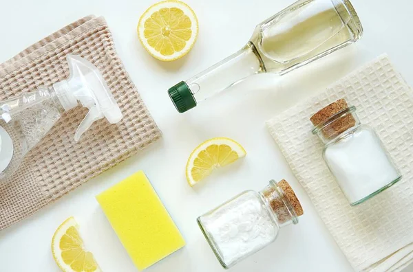 Natural all purpose cleaners, vinegar, soda, salt, lemon, flat lay composition, eco friendly, natural household.