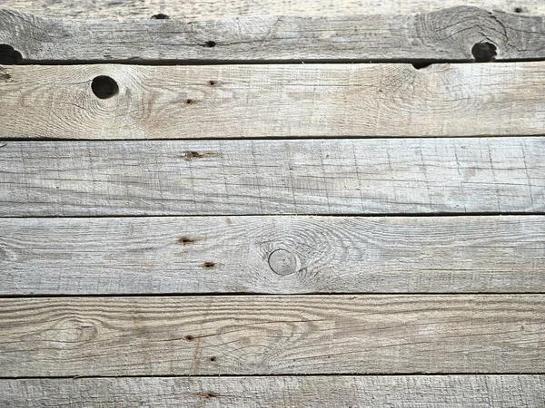 Wooden background for filming from old shabby boards. The rustic table.