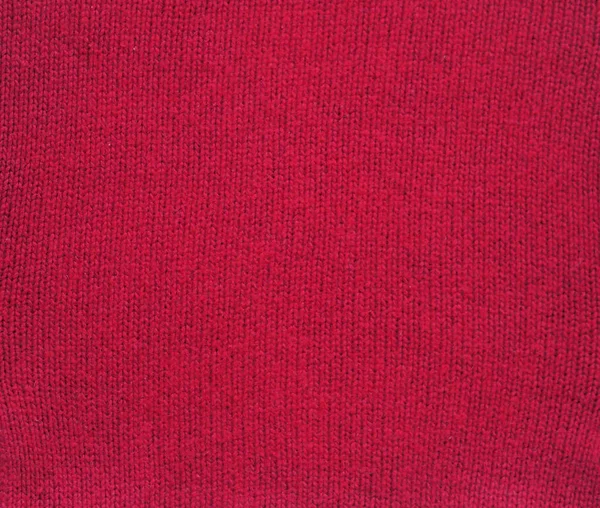 Tekstur kain rajutan. Warna merah. Garter Stitch dengan penutup wajah. Merajut pada jarum rajut. Latar belakang rajutan . — Stok Foto