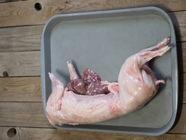 Carcass of raw rabbit meat. Home cooking. Meat harvesting. — 스톡 사진