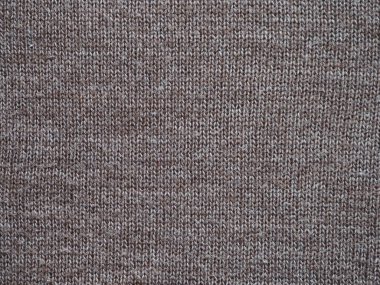 El örgüsü kahverengi yünden örülmüş bir kumaş parçası. Yukarıdan görüntüle.