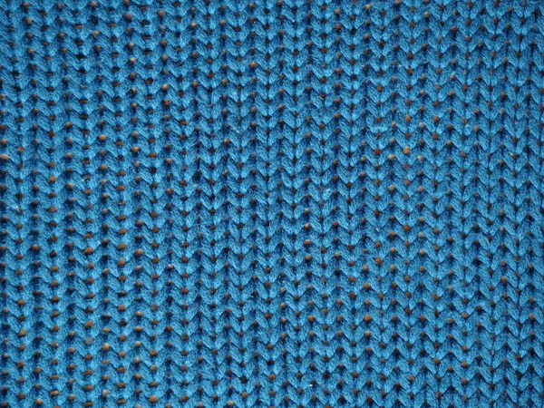 Blue knitted textured background, knit with facial loops. — Stock Photo, Image