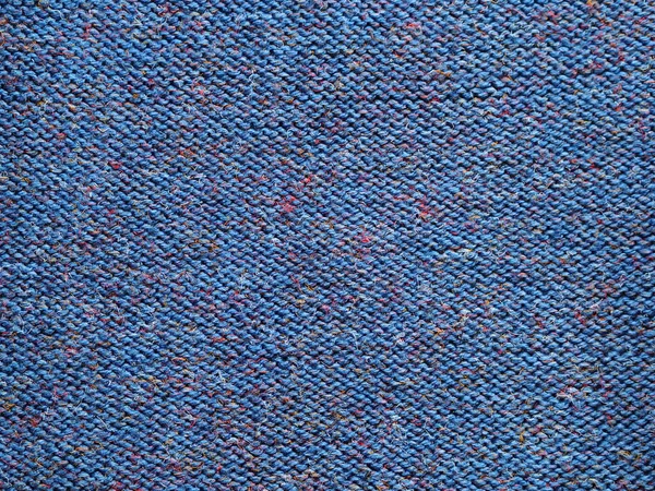 Fundo texturizado de malha azul, tricotado com laços de purl. Tricô à mão . — Fotografia de Stock