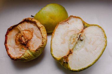 Dry apple in close-up on a light background