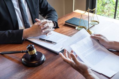 Male lawyer discussing negotiation legal case with client meetin
