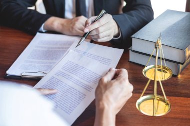 Professional male lawyer or counselor discussing negotiation leg