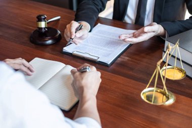 Male lawyer discussing negotiation legal case with client meetin