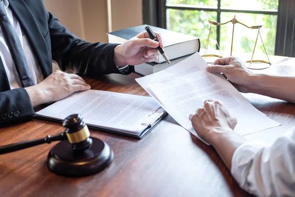 Male lawyer discussing negotiation legal case with client meetin