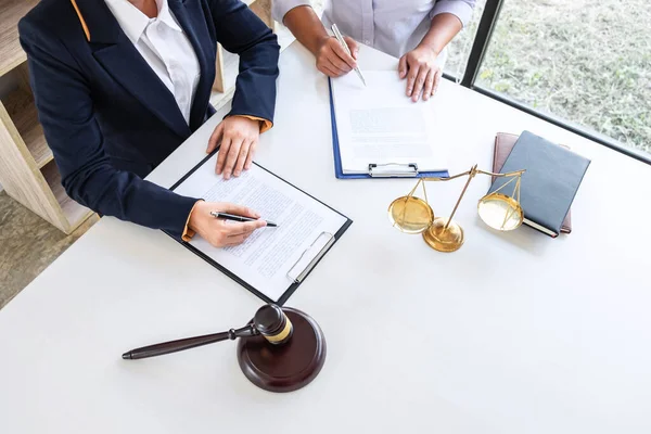 Professional Female lawyer discussing negotiation legal case wit