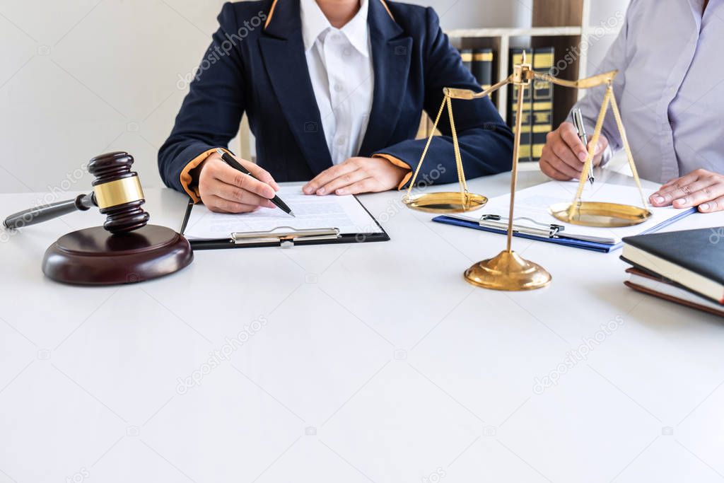 Professional female lawyer or counselor discussing negotiation l