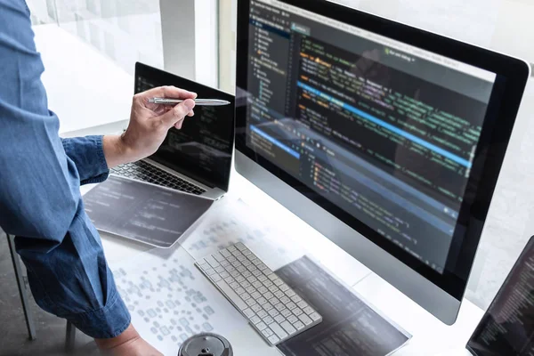 Professional Team of programmer working on project in software d
