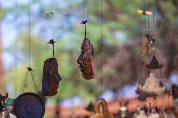 Bright souvenirs and puppets on the market in the ancient pagoda in Bagan, Myanmar