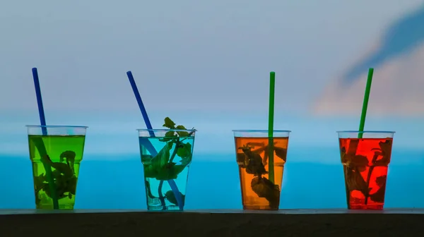 Bright Multi Colored Glasses Cocktails Background Blue Sea — 스톡 사진