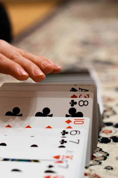 Person Doing Ribbon Spread His Playing Cards — Stock Photo, Image