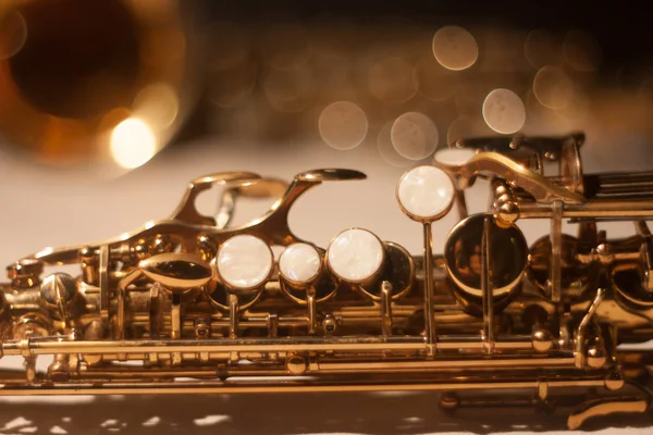Abstract saxophone. keys detail.musician instrument beautiful bokeh.soprano and alto. Stock Photo