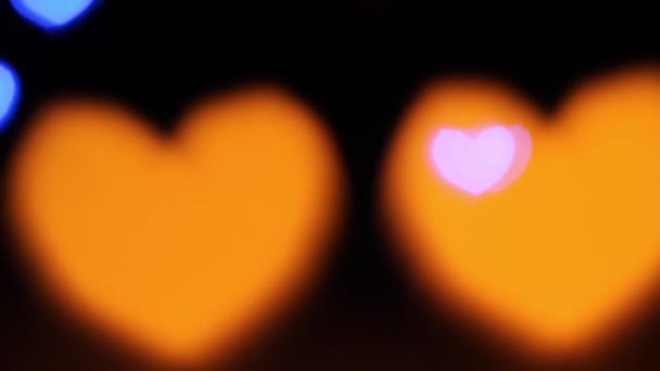 Kırmızı Turuncu Renk Mavi Kalp Şekilli Işıklar Bokeh Bulanık Işıklar — Stok video