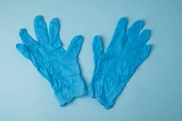 Medizinische Einweg Latex Handschuhe Auf Blauem Hintergrund Persönliche Schutzausrüstung — Stockfoto