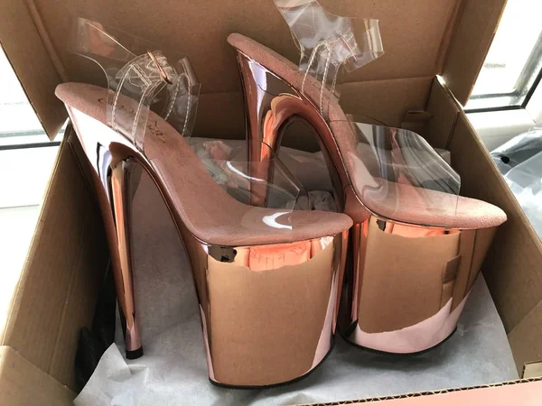 Pink strips for pole dance. High-heeled shoes. High heel. High platform. Dancing shoes. silicone. Silicone clasp. Transparent top. Shoes are transparent.