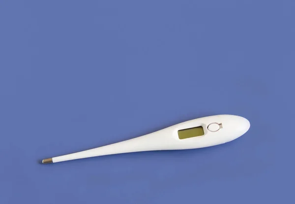 Digital thermometer. Medical thermometer. On a blue background.copyspace for text