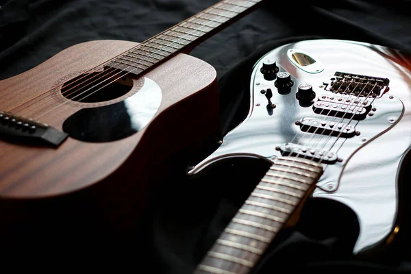 Electric guitar and acoustic guitar, macro abstract