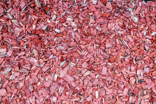 Colored mulch, red — Stock Photo, Image