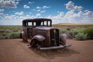 An antique, rusty car circa 1930 at the Petrified Forest Nationa