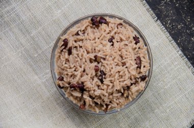 Flat view of rice with red beans in a pot clipart