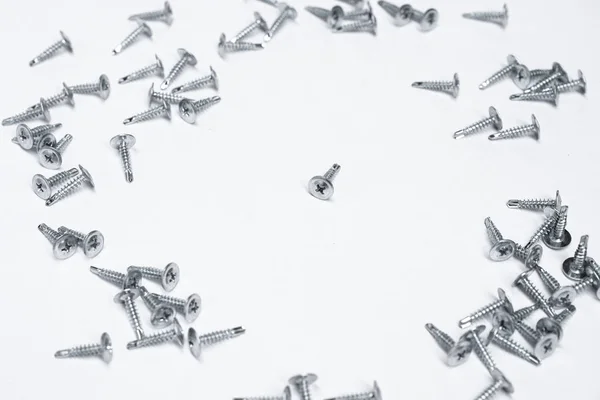Some Screws White Background Effect Prospect Centre One Screw Lies — Stock Photo, Image